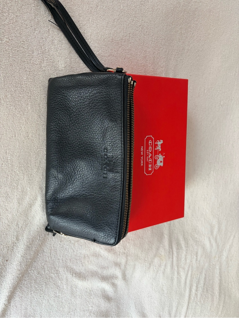 Coach Black Pebbled Leather Zip Wristlet with Tassel Strap